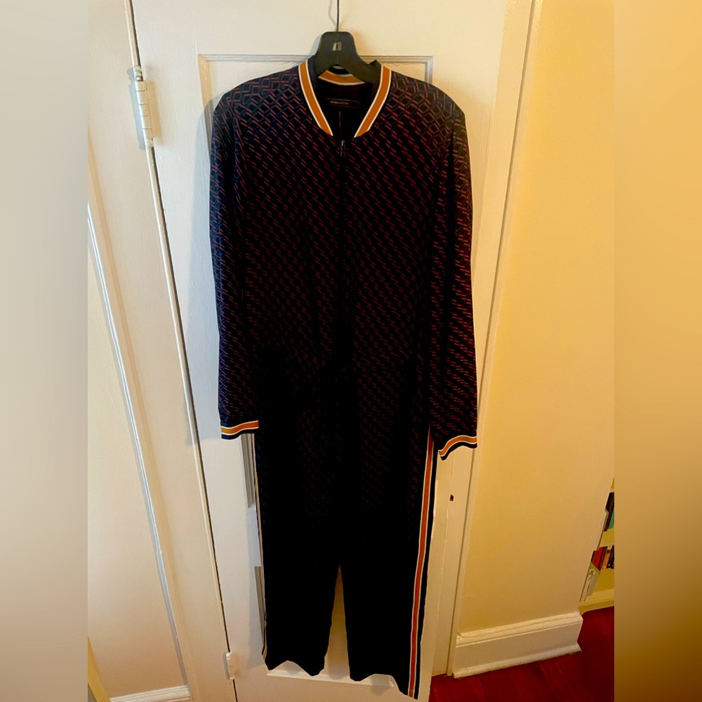 Silk Long sleeve black printed jumpsuit with details